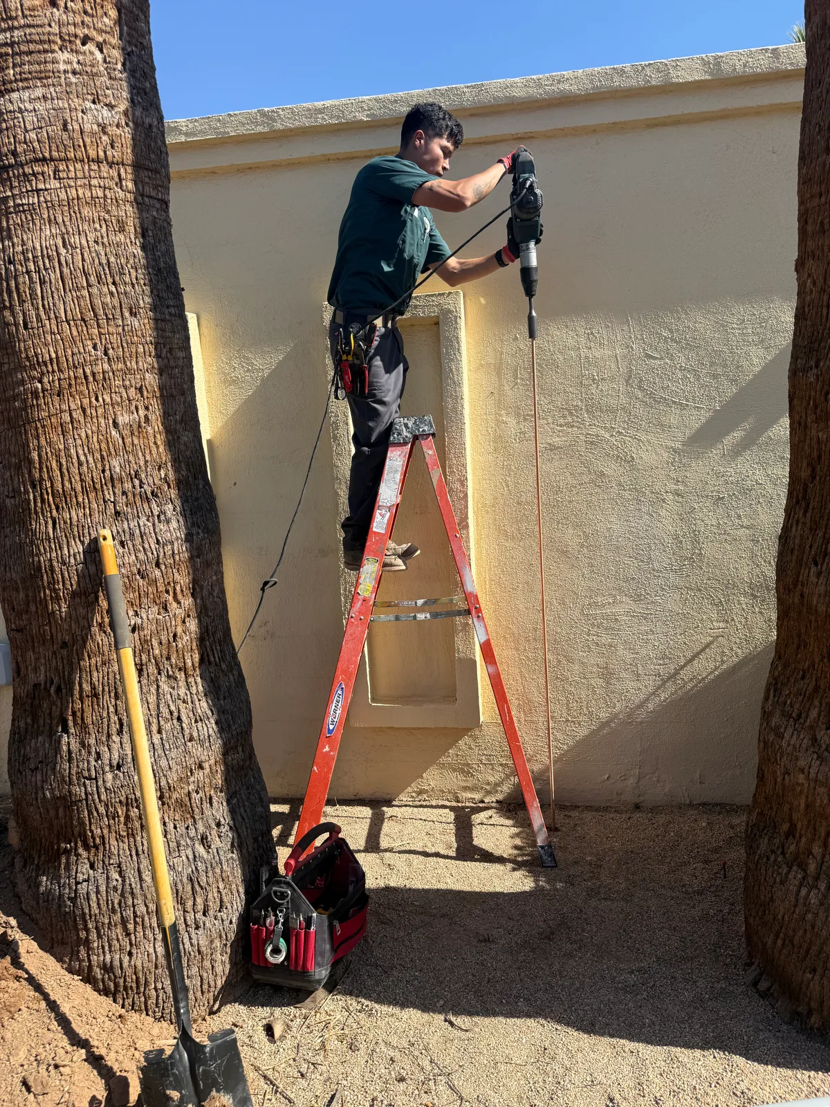 Ground-rod work during installation.